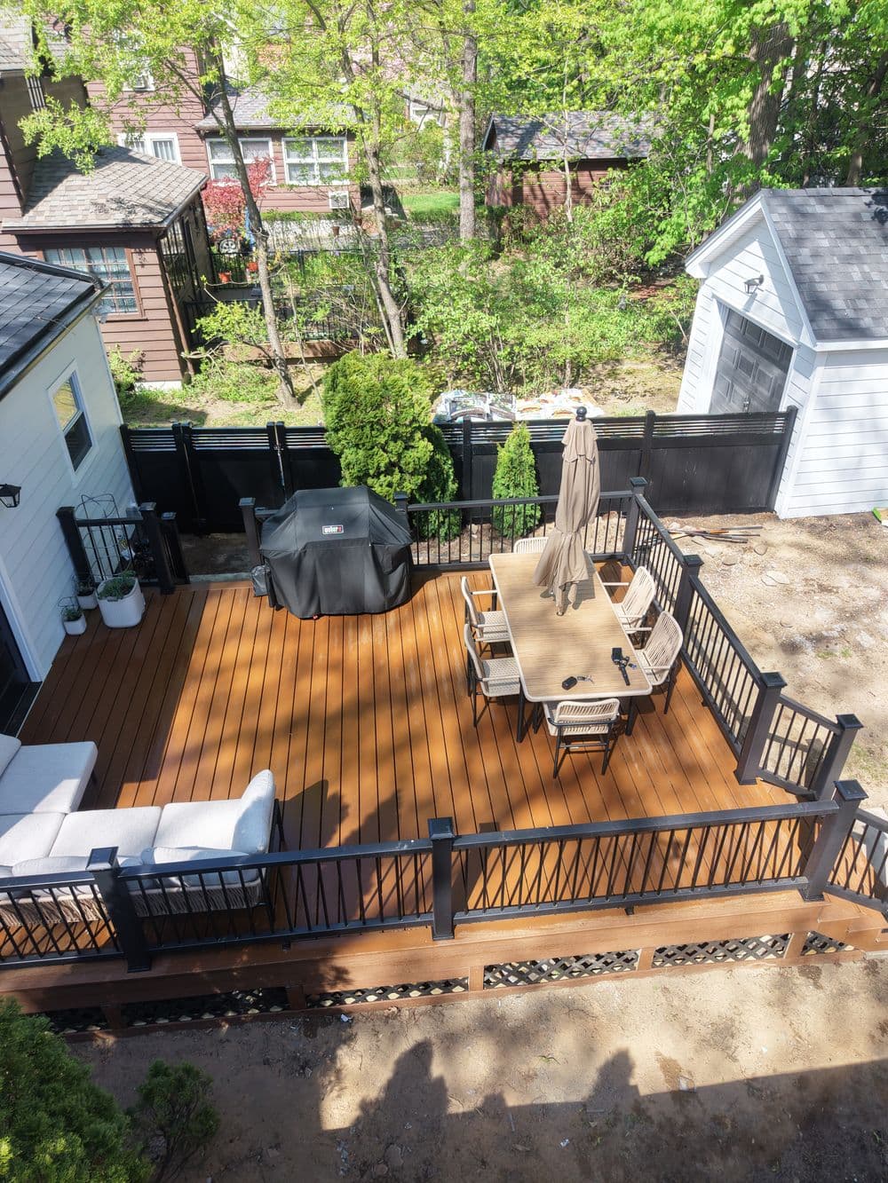 Gallery photos for Composite Deck Build Turns Unused Backyard Into Outdoor Living Space in Teaneck NJ: Image #1