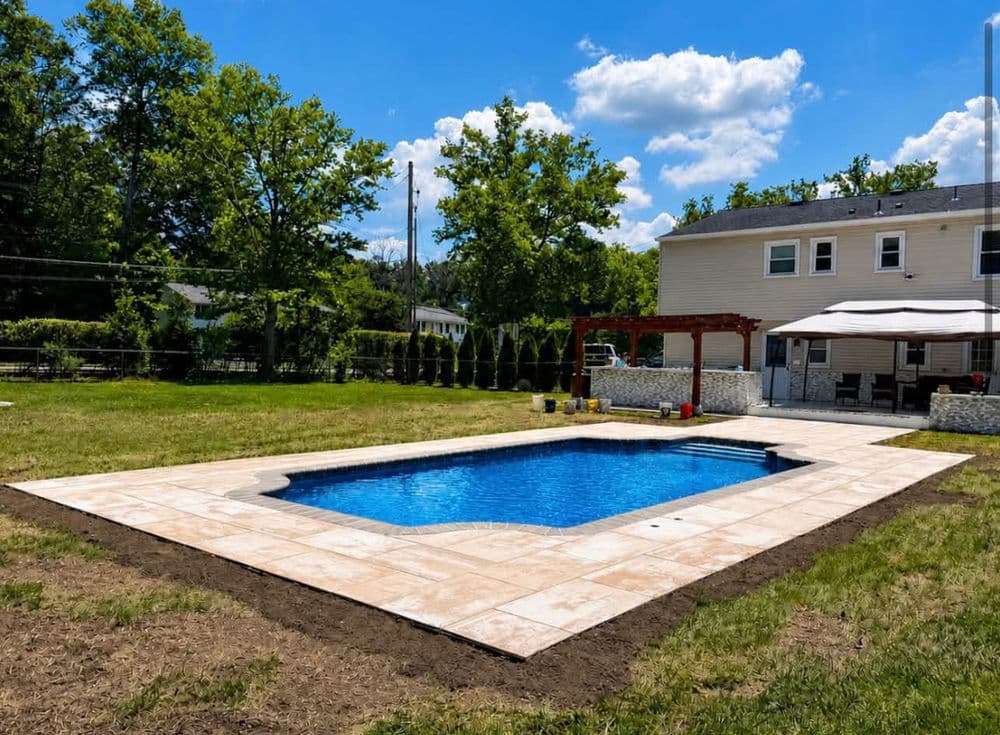 Concrete Pool Deck Replaced with Cambridge Pavers in Parsippany-Troy Hills image