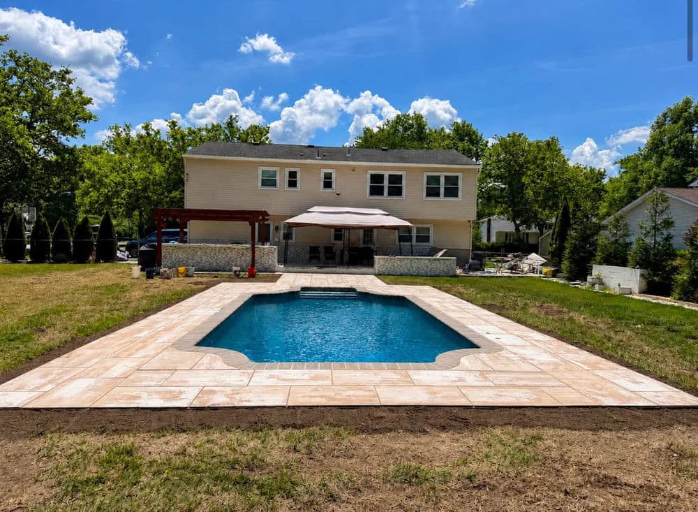 Gallery photos for Concrete Pool Deck Replaced with Cambridge Pavers in Parsippany-Troy Hills: Image #1